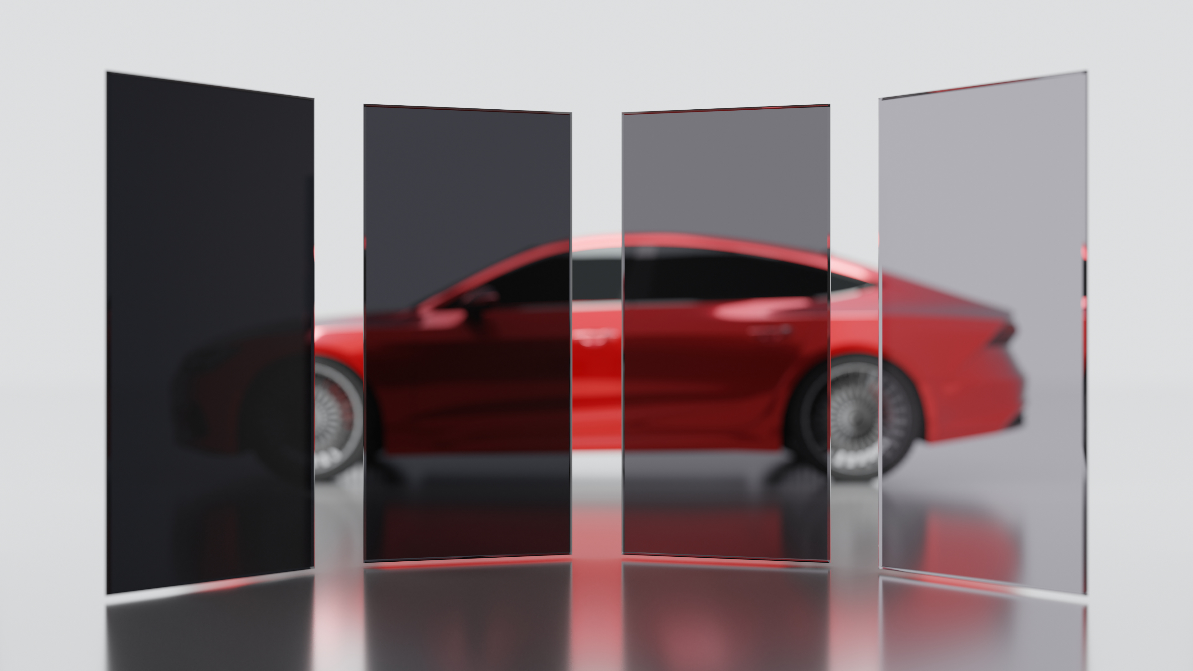Red sports car displayed through transparent glass panels in a showroom setting