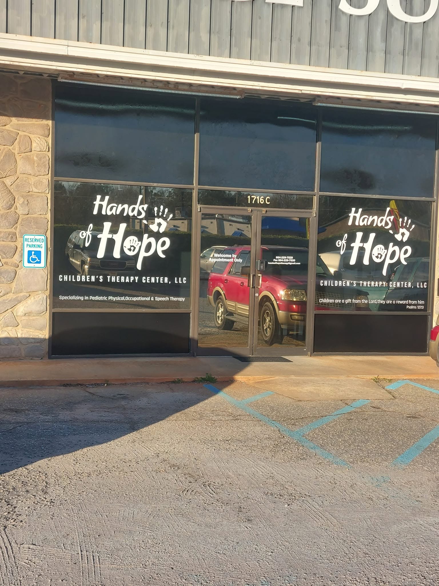 Hands of Hope Children's Therapy Center storefront with glass doors and windows at 1716 C